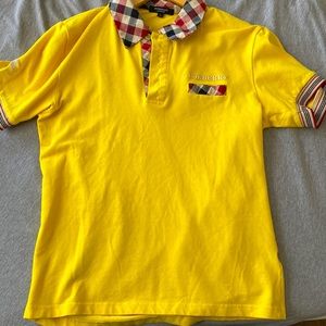 Kids large Burberry polo shirt never worn Authentic size large